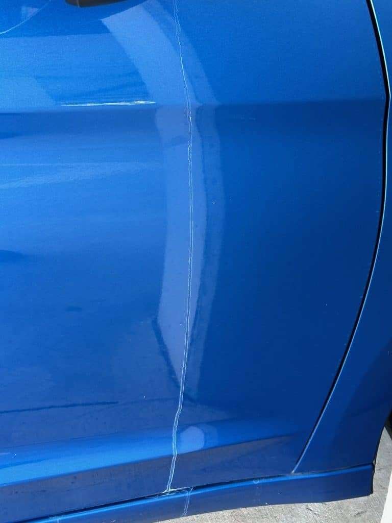 Blue paintwork close-up during paint correction