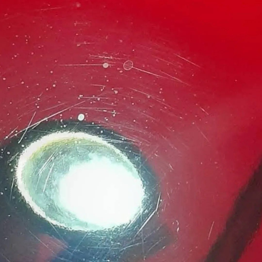 Mirror-polished exhaust tip after paint correction