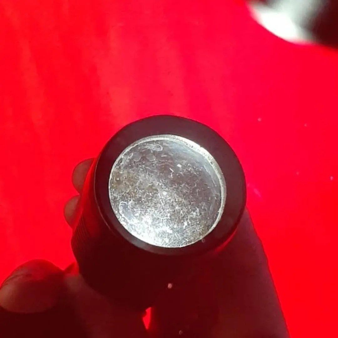 Oxidised, dull exhaust tip before paint correction