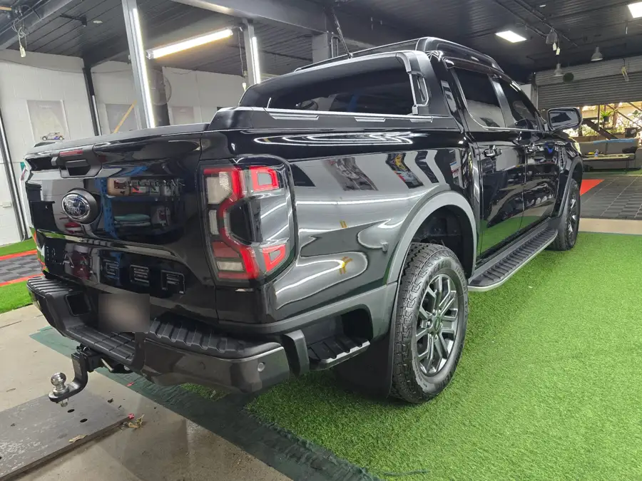 Black Ford Ranger ute with a clean, glossy finish after a pre sale detail